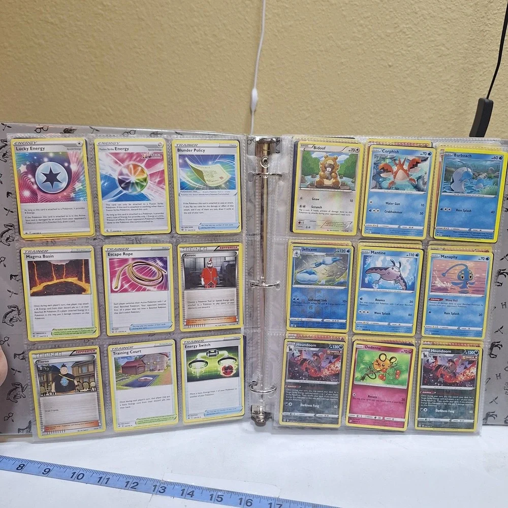 Pokémon TCG binder collection lot with approximately 171 cards from multiple set